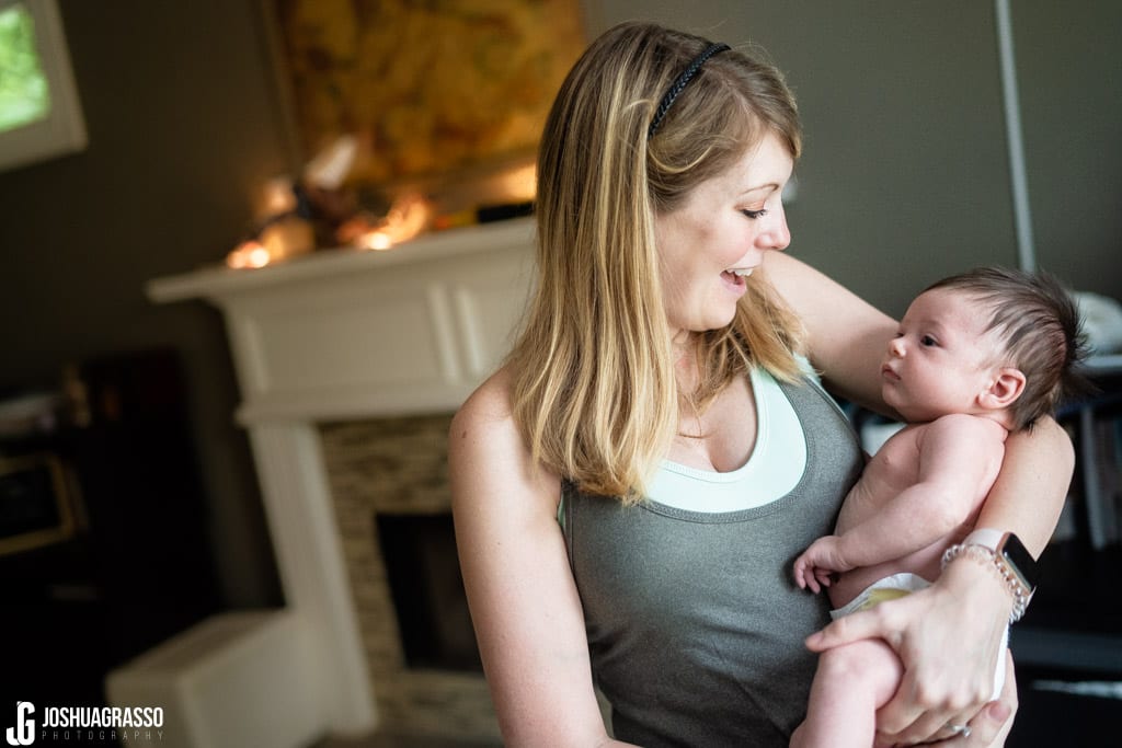Mom holding baby during atlanta family documentary lifestyle portraits