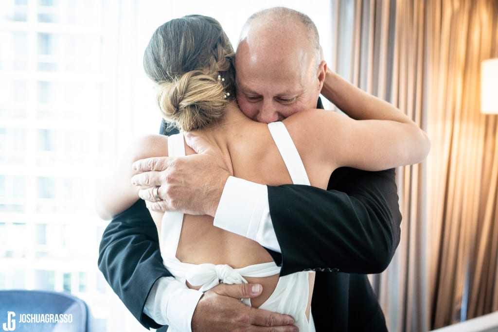 father daughter first look at the loews hotel in atlanta before a wedding