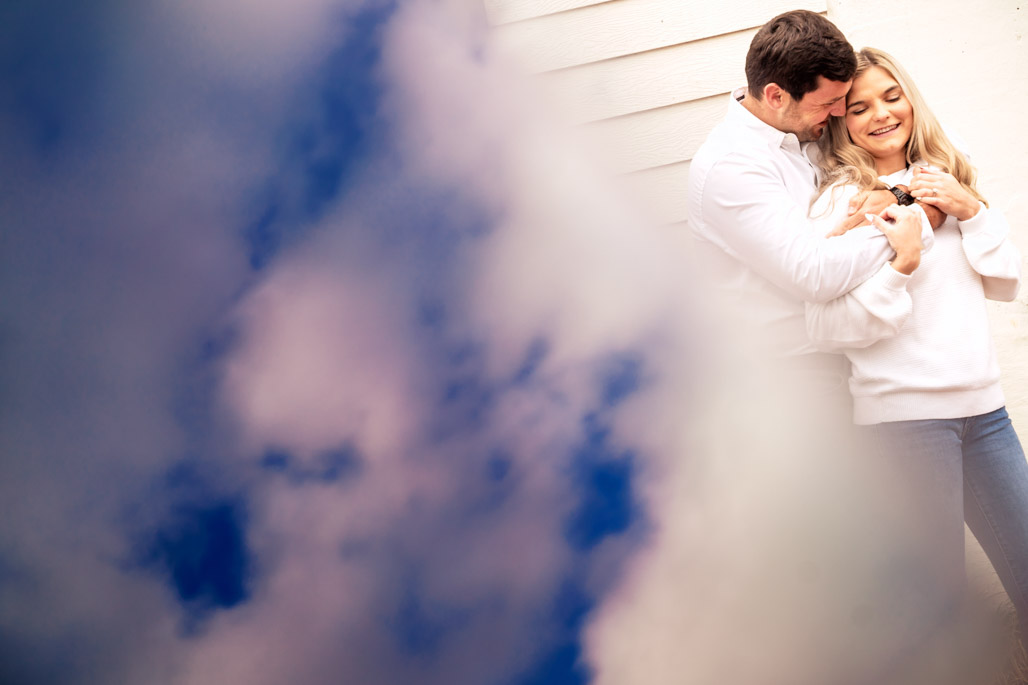 artsy couples engagment photo during engagement session in downtown ball ground georgia